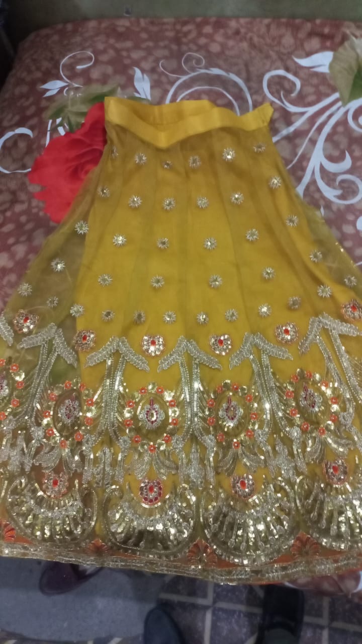 Yellow embroidery dress with sequences and embroidery style